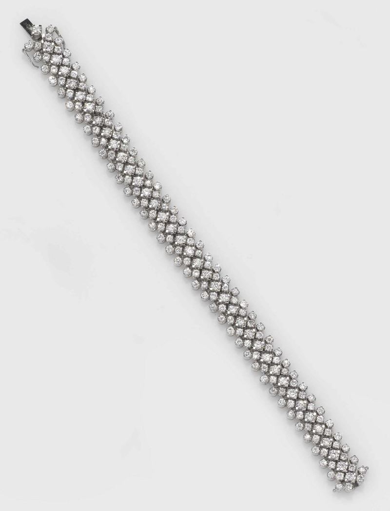 A diamond and gold bracelet. A brilliant-cut diamond weighing approximately 8,00 carats  - Auction Fine Jewels - II - Cambi Casa d'Aste