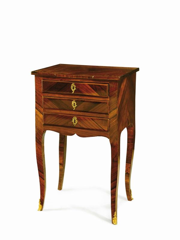 A small rosewood veneered three-drawer table, France, late 18th century