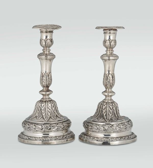 A pair of Louis XVI embossed silver candlesticks, Genoa, late 18th century