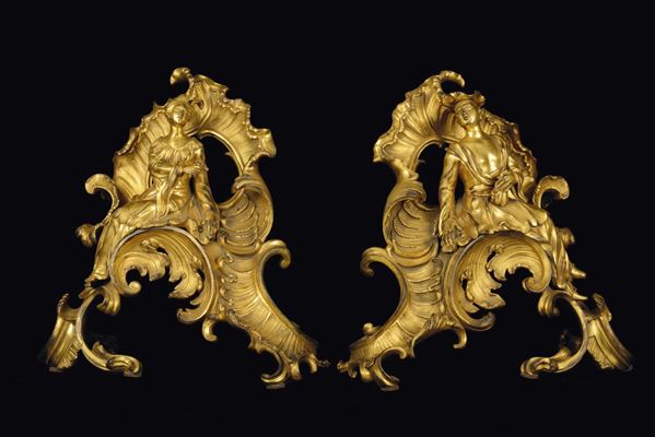 A pair of chiselled and gilt bronze firedogs, France, around 1745