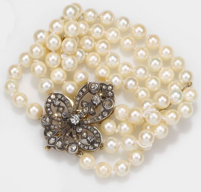 A cultured pearl multi-row bracelet and diamond clasp/brooch  - Auction Fine Jewels - II - Cambi Casa d'Aste