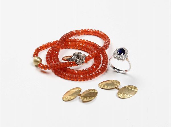 A fire opal necklace, a two rings and a pair of gold cufflinks