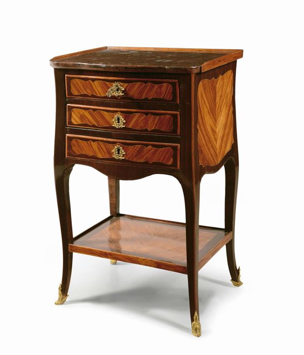 A small Louis XV three-drawer table, France, late 18th century