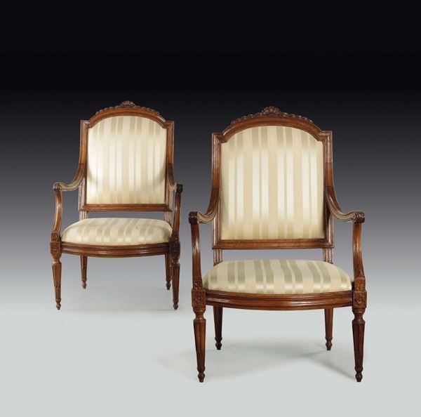 A pair of Louis XVI walnut armchairs, Genoa, late 18th century
