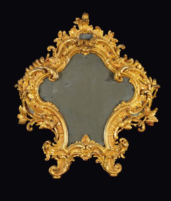 A mirror in the shape of a Louis XV table or altar-card, Genoa, mid-18th century