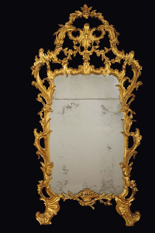 A gilt and carved wood mirror, Piedmont, mid-18th century