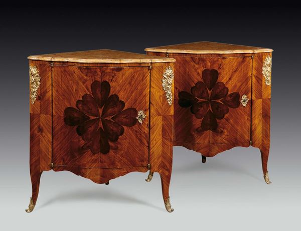 A pair of violet veneered and inlaid corner cupboards with a four-leaved clover motive, Genoa, 1860s