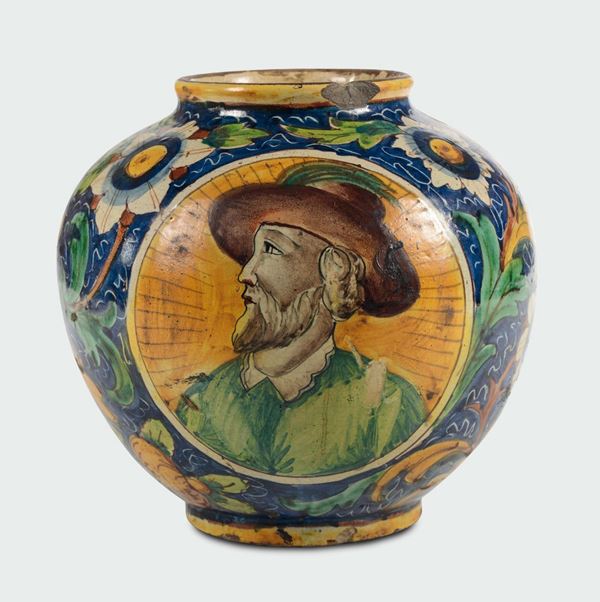 A polychrome majolica pitcher vase with male profile within medallion, Sicily, 17th century