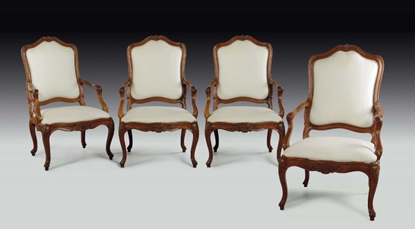 A series of four Louis XV walnut armchairs, Genoa, mid-18th century