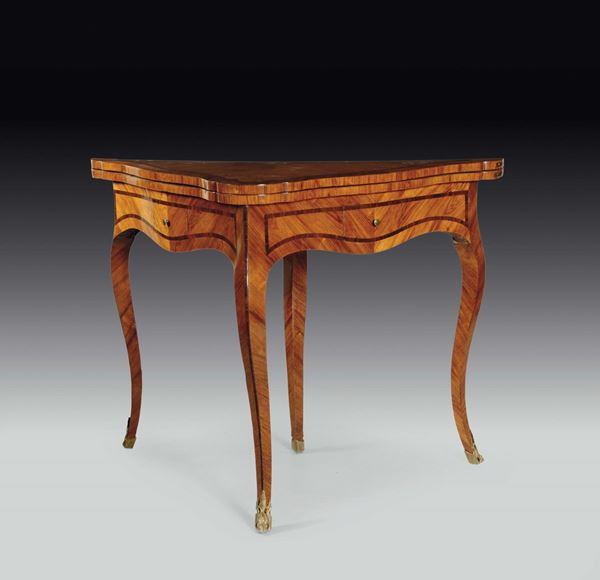 A small bois de rose veneered triangular play-table with violet threads, Genoa, late 18th century