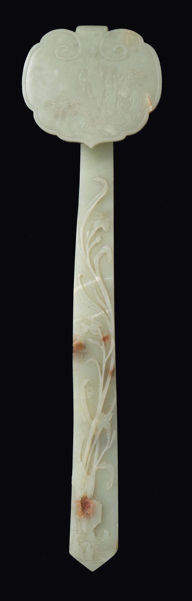 A large and important Celadon white and russet jade ruyi sceptre with landscape and naturalistic decorations, China, Qing Dynasty, Qianlong Period (1736-1795)