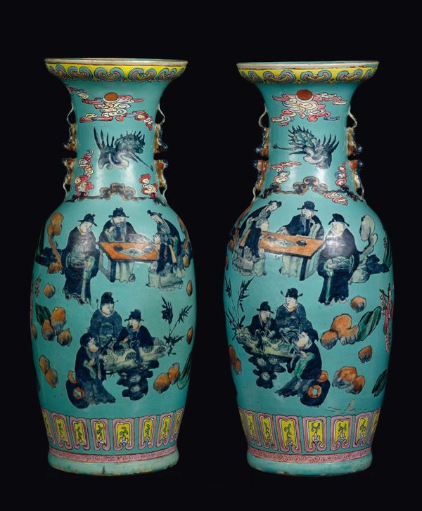 A pair of Famille-Rose turquoise-ground vases with imaginary scenes, China, Qing Dynasty, 19th century