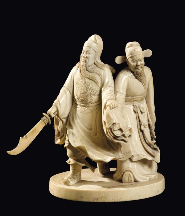 A carved ivory two warriors group, China, Qing Dynasty, late 19th century