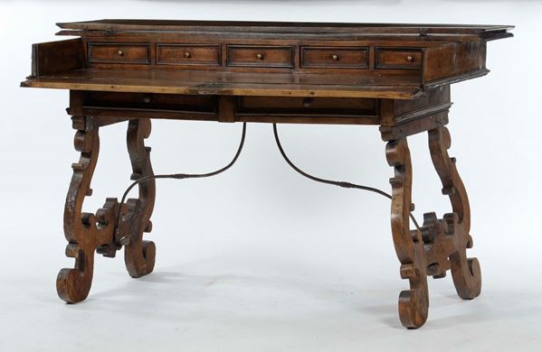 A large “St Philip” walnut travel writing-table, central Italy, 17th century