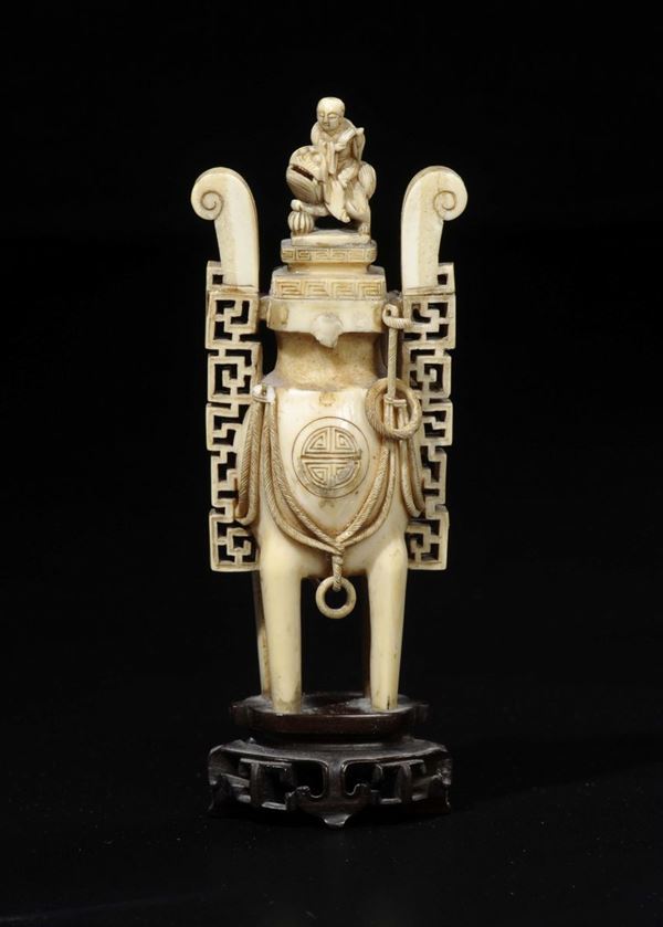 A carved ivory tripod censer and cover with wise man on Pho dog, China, early 20th century