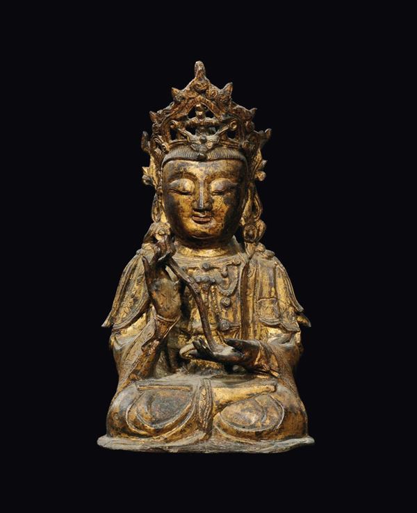 A semi-gilt bronze figure of Maitreya with ruyi, China, Ming Dynasty, 17th century