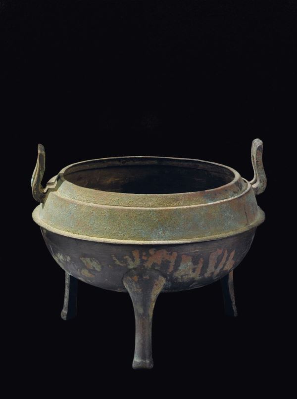A tripod bronze censer with handles, China, Zhou Dynasty (1027-221 b.C.)