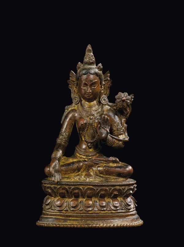 A semi-gilt bronze figure of Amitaya on a double lotus flower, China, Ming Dynasty, 17th century