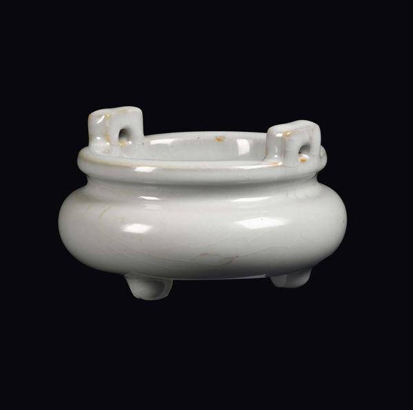 A Blanc de Chine porcelain tripod censer with handles, China, Qing Dynasty, Qianlong Mark and Period (1736-1795)