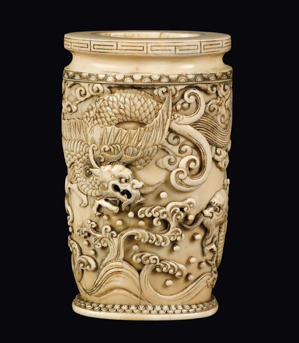 A carved ivory vase with two dragons in relief, China, Qing Dynasty, Qianlong Period (1736-1795)