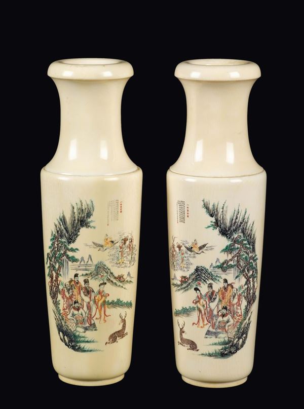 A pair of ivory vases depicting imaginary scenes and inscriptions, China, Republic, early 20th century