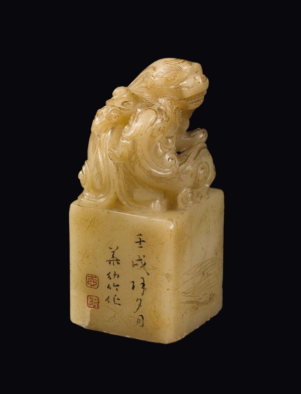 A soapstone seal engraved with inscriptions and Pho dogs, China, Qing Dynasty, probably Qianlong Period (1736-1795)