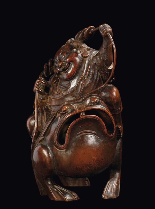 A carved bamboo wise man on a frog, China, Qing Dynasty, 19th century