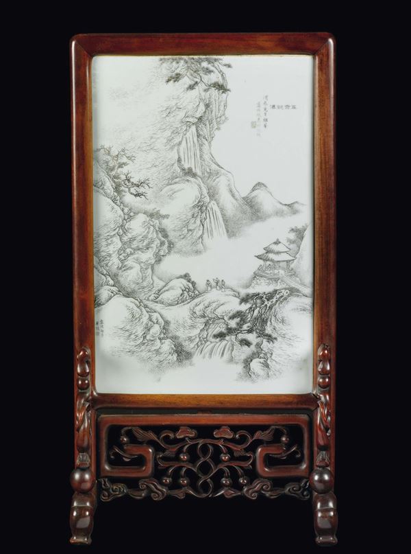A table screen with porcelain plaque with grisaille mountain landscape with waterfall, figures and inscriptions, China, Qing Dynasty, 19th century