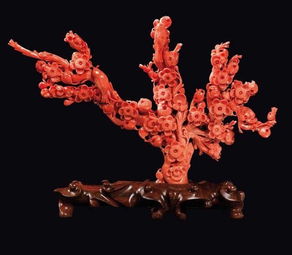 A carved coral branch with flowers and birds, China, early 20th century