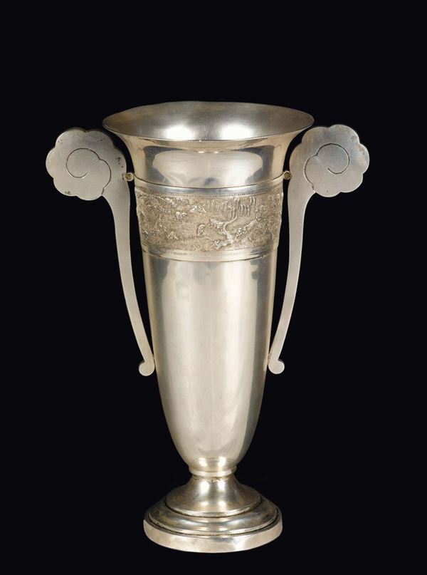 A silver vase double handled embossed with a working farmer, China, 20th century