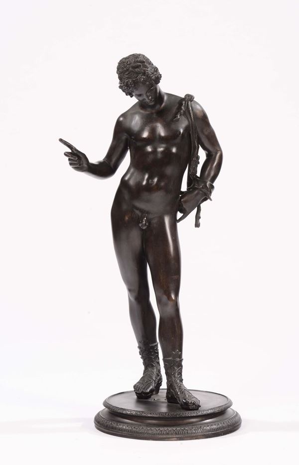 A molten, chiselled and glazed bronze Narcissus sculpture, Italian caster, 19th-20th century