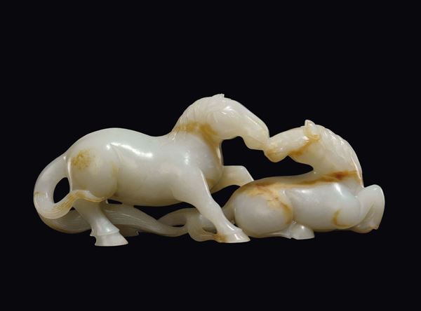 A white and russet jade  two horsess group, China, 20th century