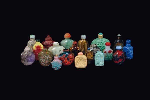 Twenty snuff bottles made of glass, hardstones, ivory and porcelain, China, 19th and 20th century