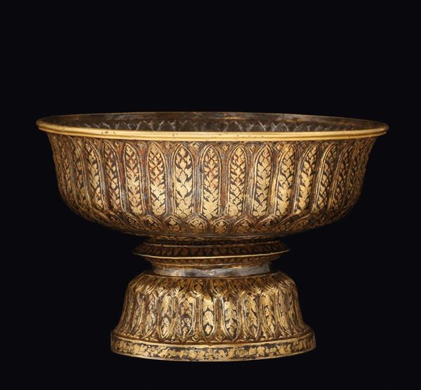 An embossed and damascened silver cup, Burma 19th-20th century