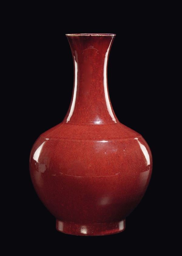 A monochrome red-glazed vase, China, Qing Dynasty, 19th century