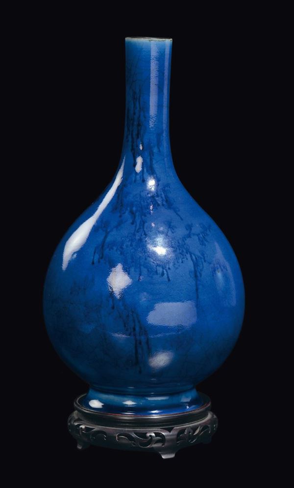 A monochrome blue porcelain bottle vase, China, Qing Dynasty, 19th century