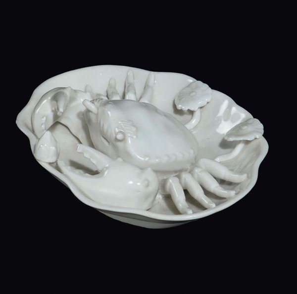 A Blanc de Chine Dehua porcelain brushpot with a crab, China, Ming Dynasty, 17th century