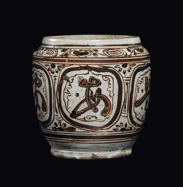 A stoneware brown-glazed jar with arcaich decoration, China, Song/Yuan Dynasty, 14th century