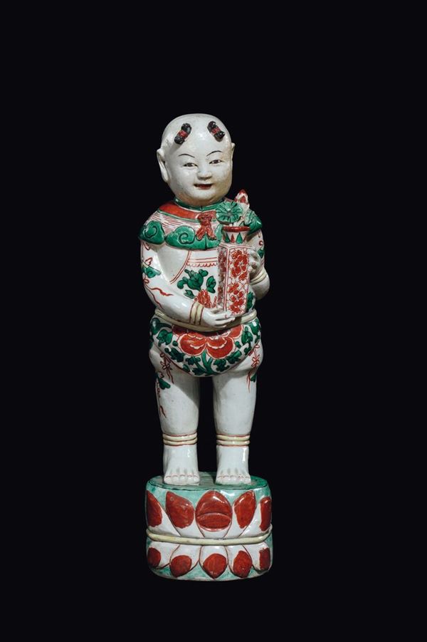 A polychrome enamelled Samson porcelain figure of O-boy with vase on lotus flower, China, Qing Dynasty, XIX secolo