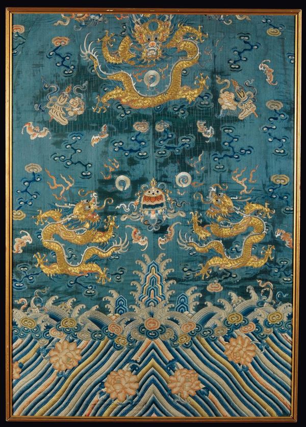 A silk blue-ground cloth embroidered with golden dragons, China, Qing Dynasty, 19th century