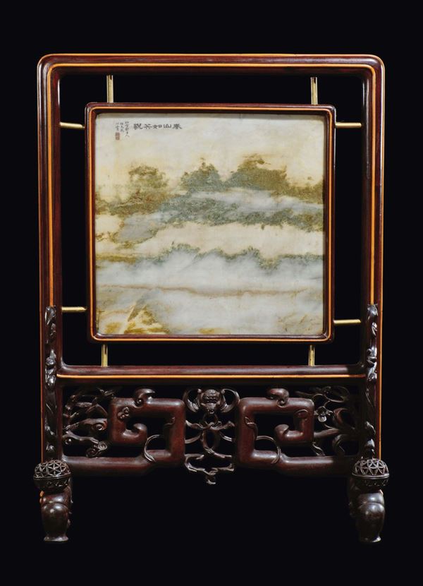 A soapstone firescreen with an inscription and fretworked wooden frame with dragon and naturalistic decoration, China, Qing Dynasty, 19th century