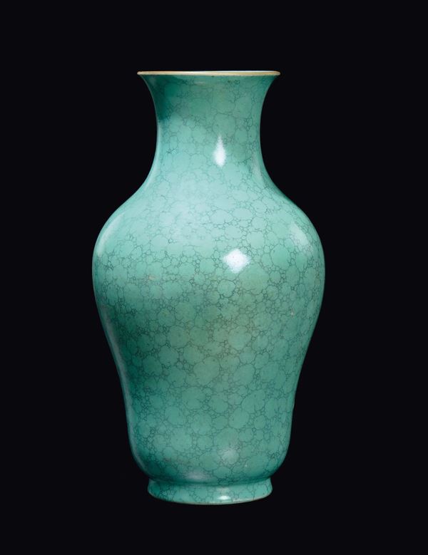A turquoise enamelled porcelain vase, China, Qing Dynasty, Qianlong Mark and Period (1736-1795)