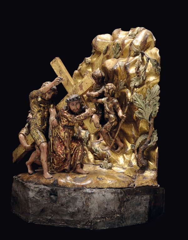 Gruppo scultoreo in legno policromo e dorato raffigurante Cristo al calvario. Bottega lombarda del XVI secolo