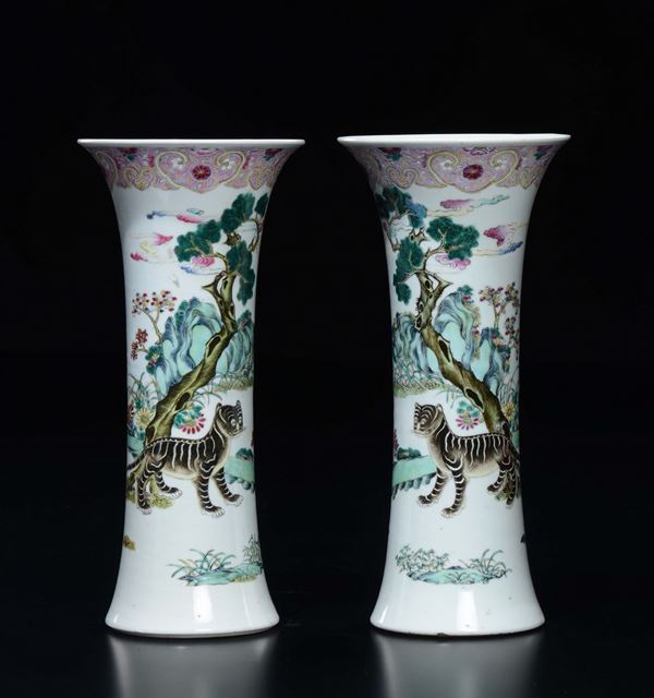 A pair of trumpet polychrome enamelled porcelain vases with tigers, China, early 20th century