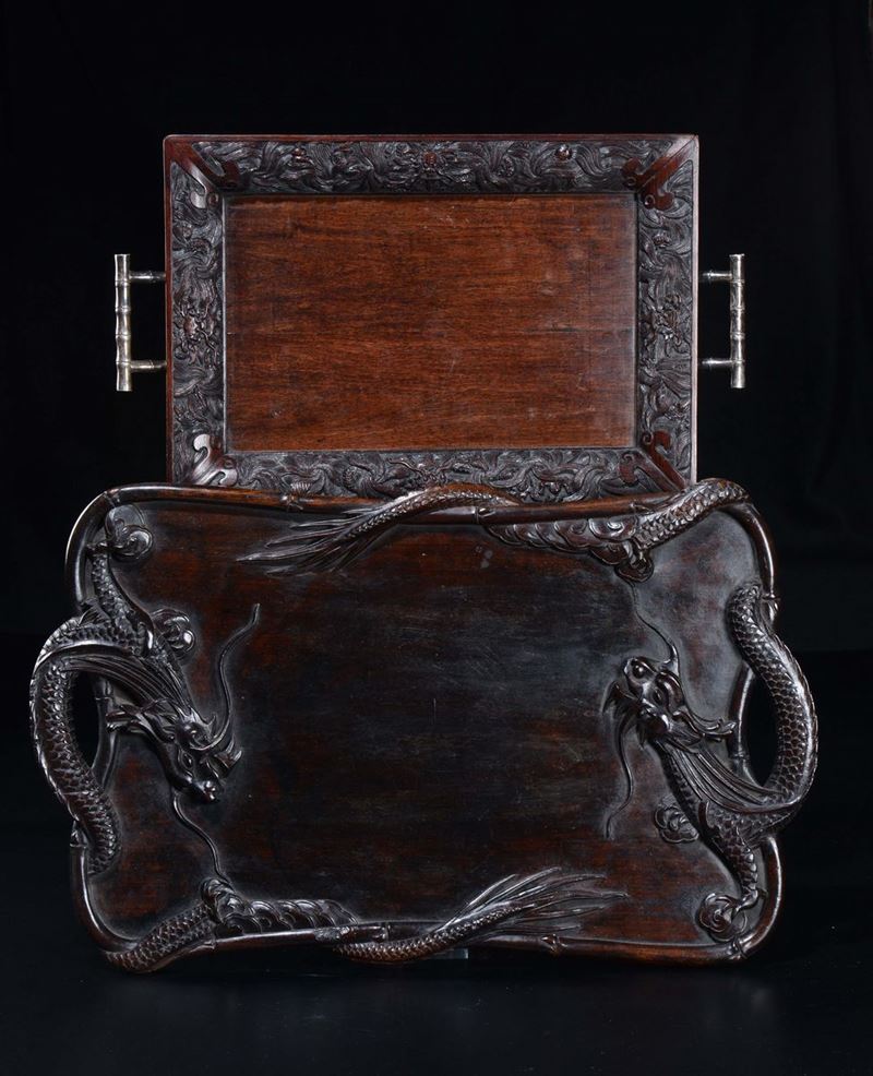 Two wooden tray, one with carved plant motif and silver bamboo handles and one with dragons in relief, China, Qing Dynasty, late 19th century  - Auction Chinese Works of Art - Cambi Casa d'Aste