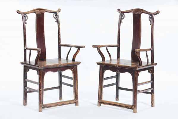 A pair of carved wooden armchairs, China, Qing Dynasty, 19th century