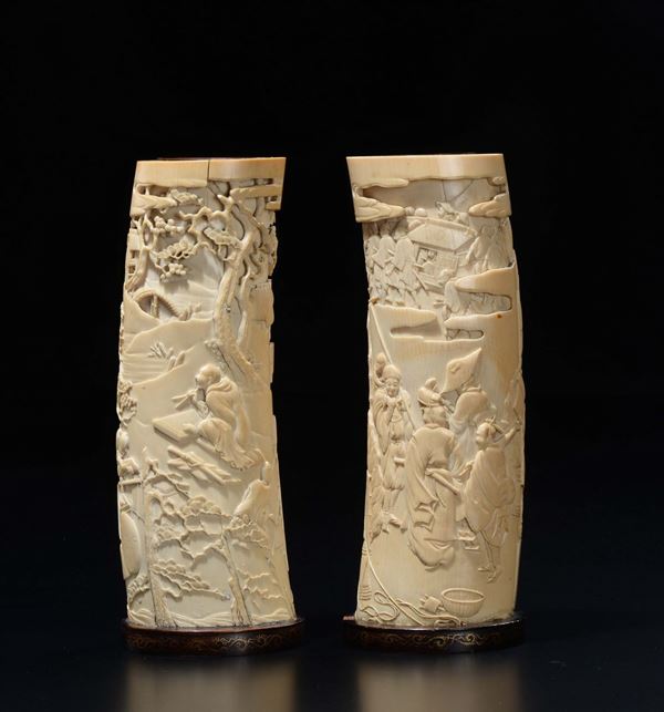 A pair of carved ivory brush pot with figures, Japan, early 20th century