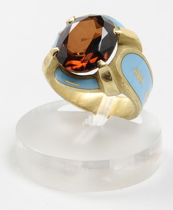 A citrine and enamel ring