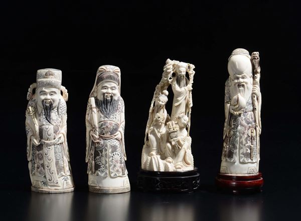 Four carved ivory figures of wise men and dignitaries, China, early 20th century