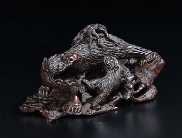 A carved wood Pho dogs group, China, 20th century